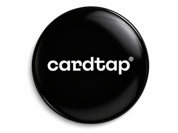 Cardtap NFC Smart Tag Black Edition featuring built-in NFC technology for instant digital business card sharing. Compact adhesive NFC sticker for smartphones, laptops, desks, and workspaces, enabling contactless networking, contact exchange, social media sharing, website access, and digital profile connections with a single tap.