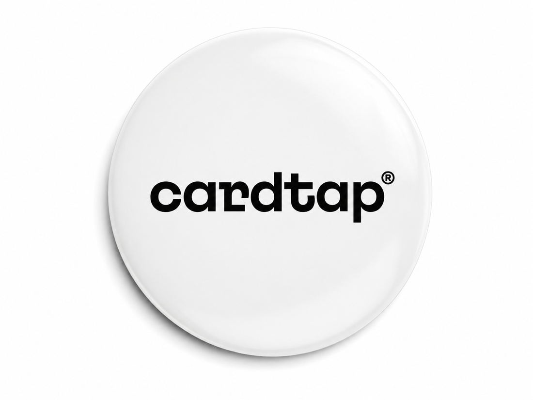 Cardtap NFC Smart Tag White Edition on smartphone, featuring a compact 3x3 cm design with built-in NFC technology. Smart adhesive NFC sticker for phones, laptops, desks, and workspaces, enabling instant digital business card sharing, contact exchange, social media links, and contactless networking with a single tap